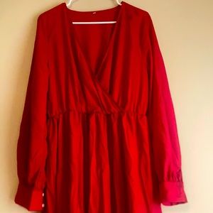 Red large long sleeved dress only worn once low cut high slits